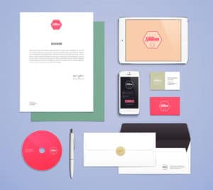 A stylish collection of branded stationery and packaging items.