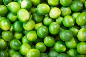 Close-up of fresh green peas packed tightly together.