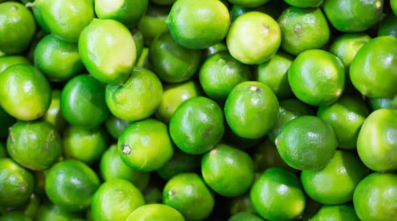 Close-up of fresh green peas packed tightly together.
