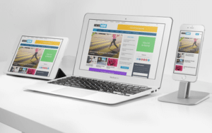 Tablet, laptop, and smartphone on display.