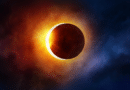 A vibrant solar eclipse with glowing corona and darkened moon.