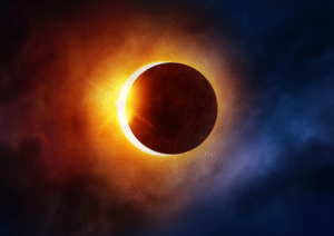 A vibrant solar eclipse with glowing corona and darkened moon.