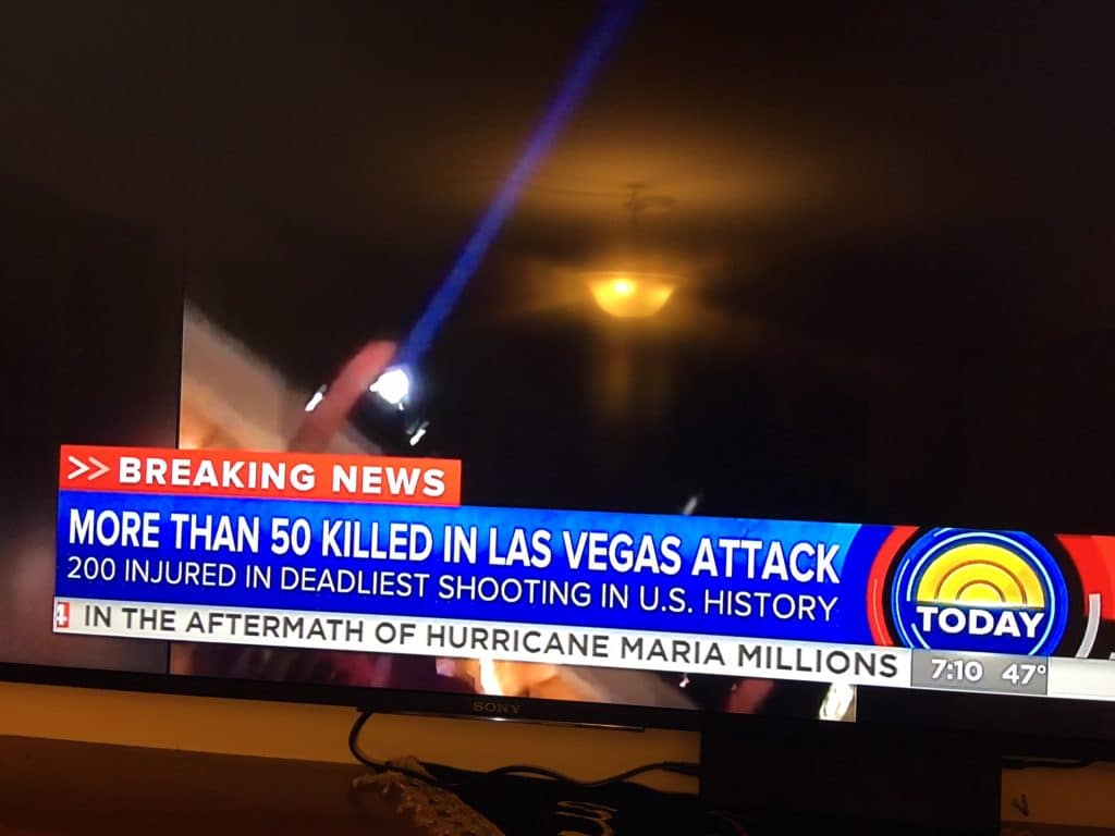News broadcast reporting over 50 deaths in a Las Vegas attack.