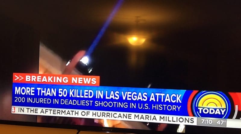 News broadcast reporting over 50 deaths in a Las Vegas attack.