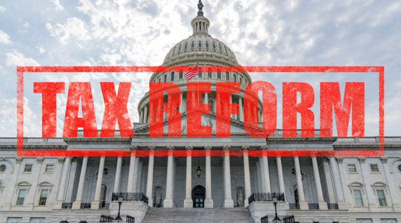 The Capitol building with a bold 'Tax Reform' stamp across it.