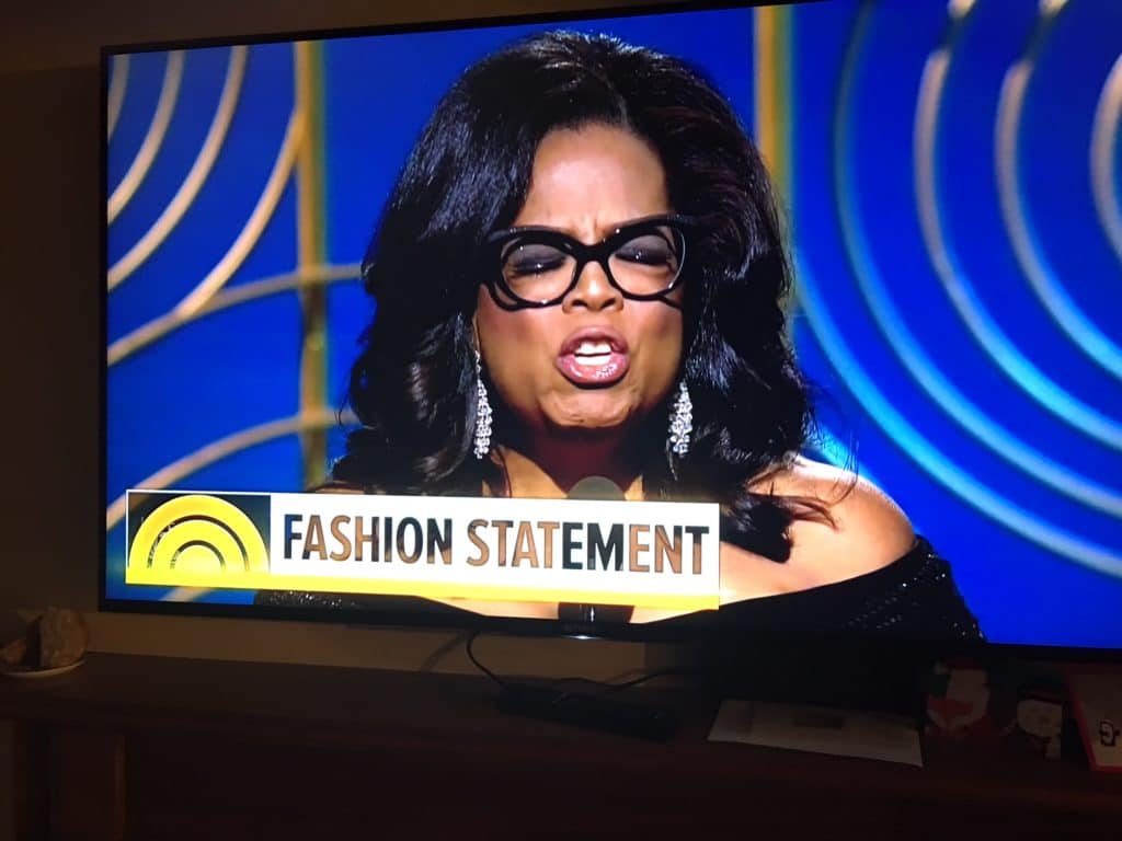 Oprah Winfrey wearing large black glasses on a TV show segment titled Fashion Statement.