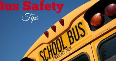 A school bus with a safety tips message for back-to-school season.