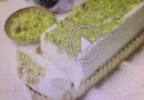 A tray of pistachio-covered Turkish delight being prepared.