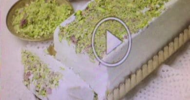A tray of pistachio-covered Turkish delight being prepared.