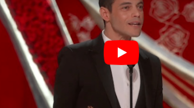 Man accepts Oscar for lead role with gratitude on stage.