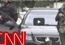 CNN report on New Zealand terrorist attacks with armed police presence.