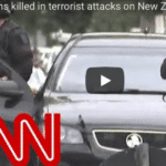 CNN report on New Zealand terrorist attacks with armed police presence.