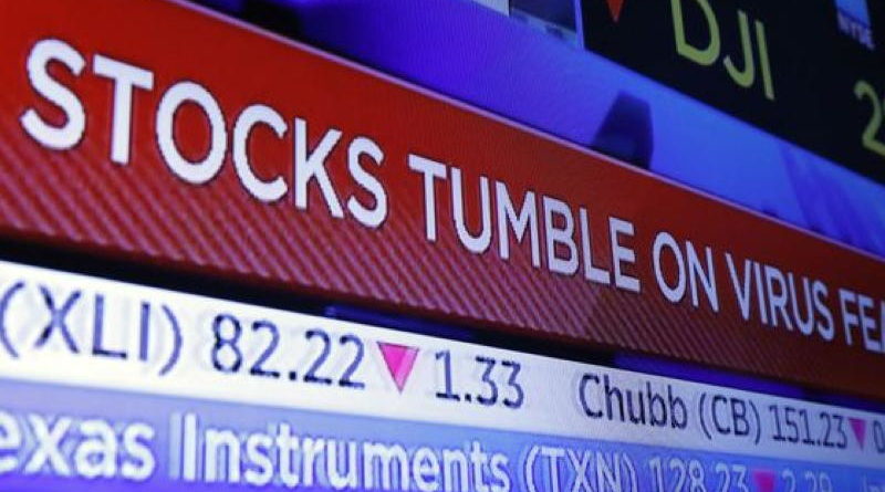 Stock market ticker shows Dow Jones index dropping.