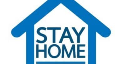 Blue house outline with 'Stay Home' message inside.