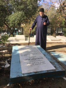 The illuminated facade of Al-Ajami Restaurant at night.