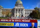 Joe Biden elected as the 46th U.S. President shown on a news banner.