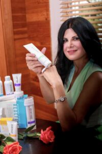 The illuminated facade of Al-Ajami Restaurant at night.