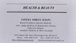 The illuminated facade of Al-Ajami Restaurant at night.