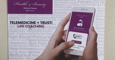 Person holding phone showing life coaching advertisement for telemedicine and trust.