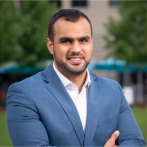 The illuminated facade of Al-Ajami Restaurant at night.