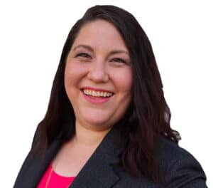 The illuminated facade of Al-Ajami Restaurant at night.