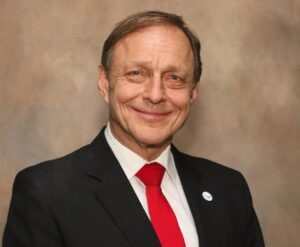 The illuminated facade of Al-Ajami Restaurant at night.
