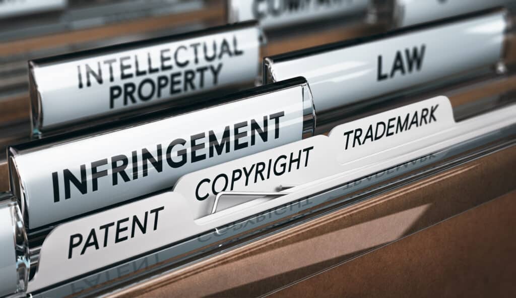 File folders labeled with intellectual property terms like copyright and patent.