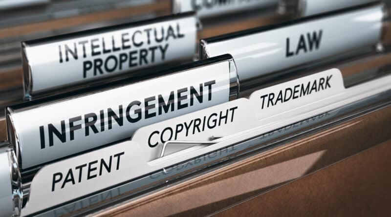 File folders labeled with intellectual property terms like copyright and patent.